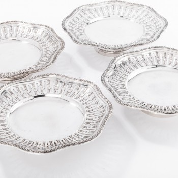 Goldsmith A. AUCOC Suite of four 19th solid silver cups