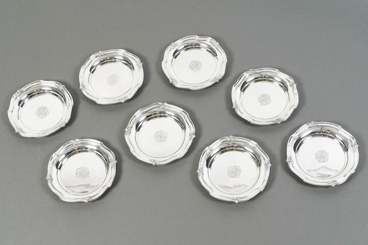 ORFEVRE HENIN - Suite of eight solid silver bottle coasters from the 20th century