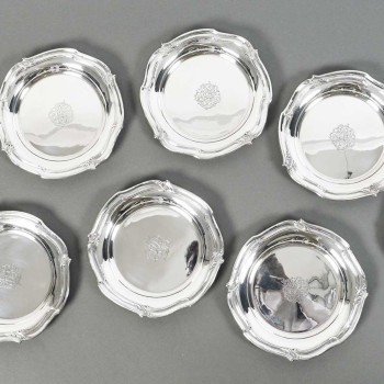 ORFEVRE HENIN - Suite of eight solid silver bottle coasters from the 20th century