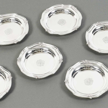 ORFEVRE HENIN - Suite of eight solid silver bottle coasters from the 20th century