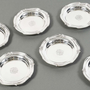 ORFEVRE HENIN - Suite of eight solid silver bottle coasters from the 20th century