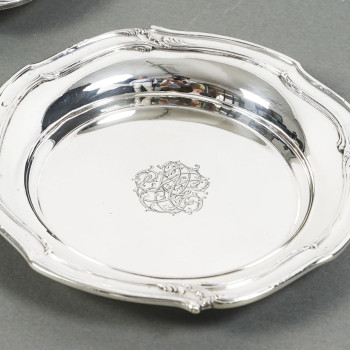 ORFEVRE HENIN - Suite of eight solid silver bottle coasters from the 20th century